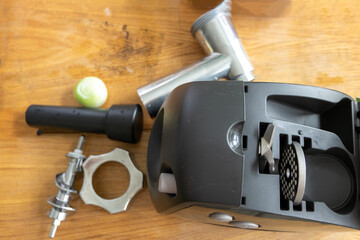 disassembled automatic meat grinder. The preparation of the filling for dumplings.
