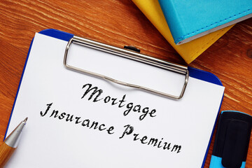 Financial concept about Mortgage Insurance Premium with sign on the piece of paper.