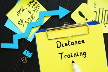 Distance Training inscription on the piece of paper.