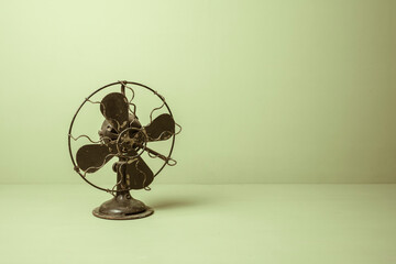 old fan on a green background
