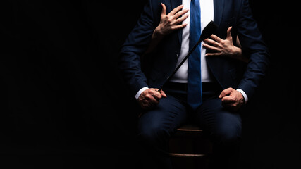 dominant man with a whip Flogger and the hands of his submissive girl