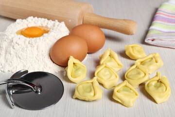 Making tortellini stuffed with spinach and ricotta