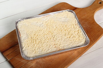 Uncooked Lasagne Bolognese in Disposable Foil Dish