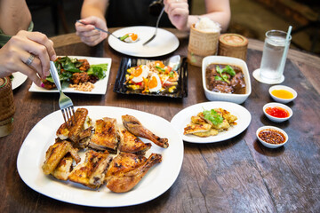 Grilled chicken on plate, style thai food.