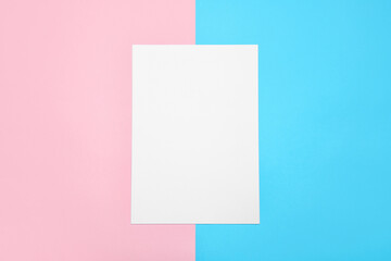 Blank paper sheet on color background