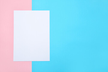 Blank paper sheet on color background