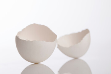 Broken egg shell on white background.