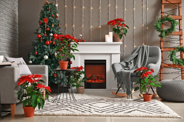 Interior of living room with fireplace decorated for Christmas