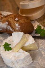 Camembert cheese on a wooden background, High quality photo