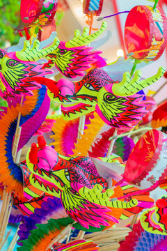 Colorful dragon plastic and paper toy for chinese new year happy and good luck