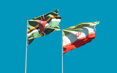 Flags of Iran and Dominica.