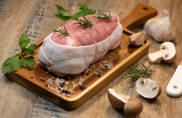 Raw veal meat on wood background, France