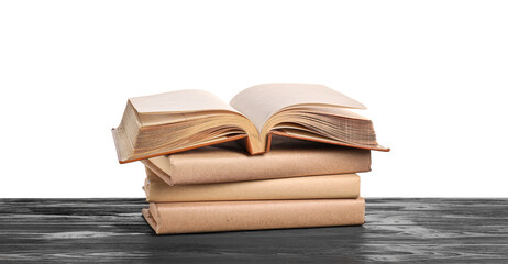 Old books on table against white background