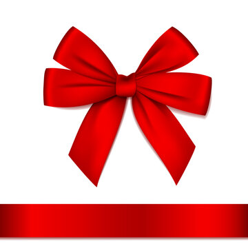 Red bow with ribbon isolated on white.