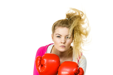 Woman wearing boxing gloves