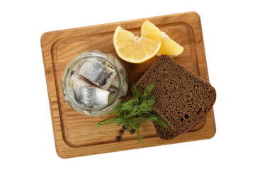 Board with herring fish, bread and lemon isolated on white background
