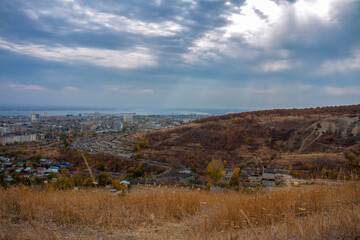 view of the city from a high mountain with a river