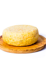 Spanish omelette on a wooden tray on white background