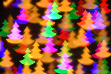 colorful fir trees illumination for holiday or abstract boke background