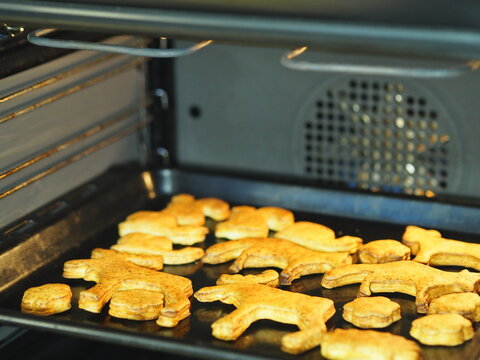 Christmas Cookies In The Shape Of An Animal Baked In A Home Oven For The Holiday.Christmas Prep Chores.