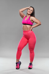 Curvy woman doing fitness exercises