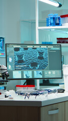 Empty laboratory modernly equipped with nobody in it, prepared for pharmaceutical innovation late at night using high tech and microbiology tools for scientific research. Vaccine against covid19 virus