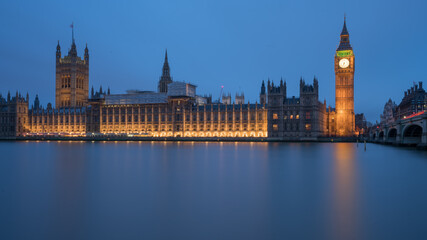 Big Ben, Houses of Parliament and Westminster bridge at night in London, UK