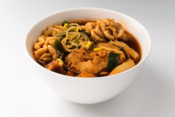 Cooking fish broth on a white background