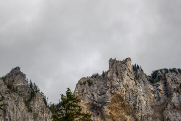 rugged mountains and grey clouds at the sky