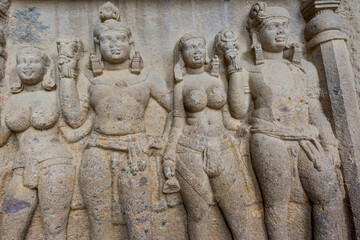 Buddha sculptures on wall at entrance to the largest Kanheri cave at Sanjay Gandhi National Park, Mumbai, India