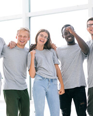 Fototapeta premium happy business team standing in bright office.