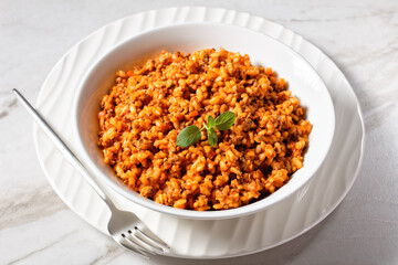 ground beef risotto bolognese in a bowl