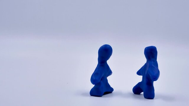Stop motion animation plasticine. A person is divided into two