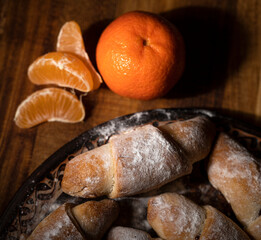 Sweet rolls filled with jam on the kitchen table