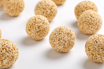 Indian sweet for traditional festival makar sankranti :Rajgira laddu made from Amaranth seed on white background
