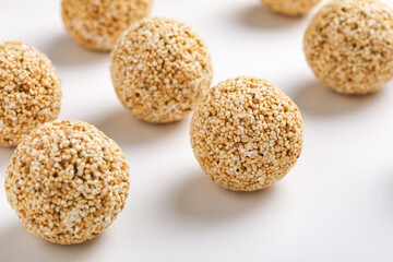 Indian sweet for traditional festival makar sankranti :Rajgira laddu made from Amaranth seed on white background