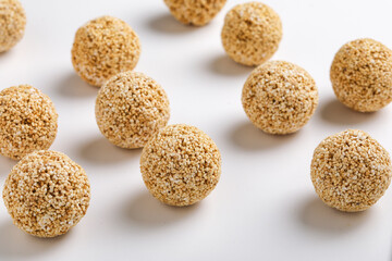Indian sweet for traditional festival makar sankranti :Rajgira laddu made from Amaranth seed on white background