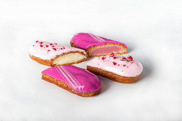 Custard cakes with butter cream on a light background. Home delivery. Festive concept. Quarantine.