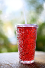 Cocktail with cranberry juice and ice cubes