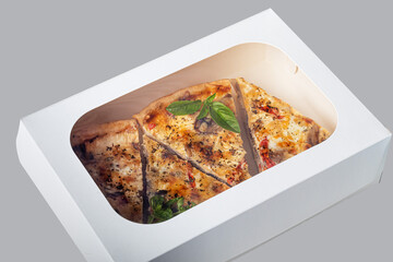 Quiche stuffed with mushrooms, chicken and tomato from shortcrust pastry on a light background. Home delivery. Festive concept. Quarantine.