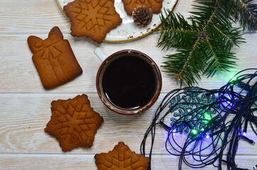 New Year's atmosphere, Christmas mood and coziness, warming winter coffee drink, relaxation at home on holiday, snowflake-shaped cookies, holiday baked goods