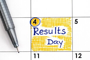 Reminder Results Day in calendar with pen