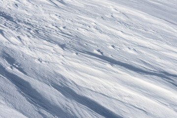 Snow surface with wind traces.Winter background.