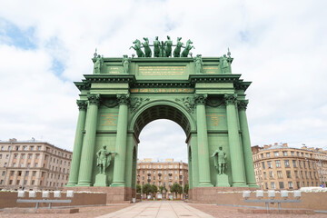 Fototapeta na wymiar Saint-Petersburg, Russia, 23 August 2020: Narva Triumphal Arch was erected in Stachek Square to commemorate the Russian victory over Napoleon in 1812. Architectural monument of the empire style.
