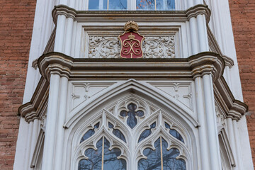 Facade of the palace in the Gothic style. Imperial palace stables