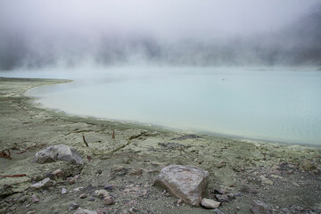 Kawah Putih or White Crater is a famous sulfur rich volcanic crater lake in West Java, Indonesia