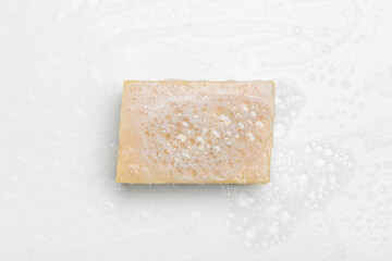 Soap with foam on a white background Soap used in everyday life, including washing, bathing