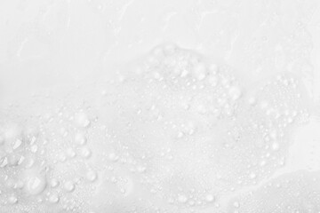 Abstract background white soapy foam texture. Shampoo foam with bubbles