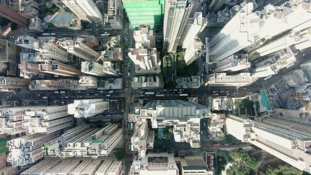 Downtown Hong Kong city skyscrapers and urban traffic, Aerial view.