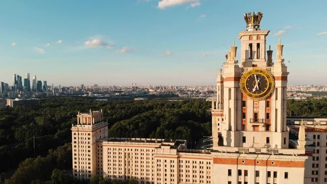 Towers of Lomonosov Moscow State University Skyscraper with big vintage clock on it 